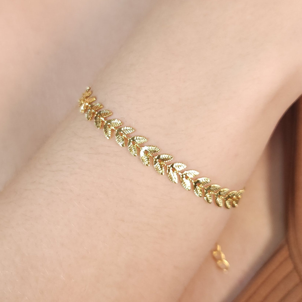 Pulseira folhas trabalhada dourado