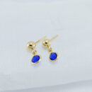 Brinco infantil esfera dourada pêndulo com pedra azul