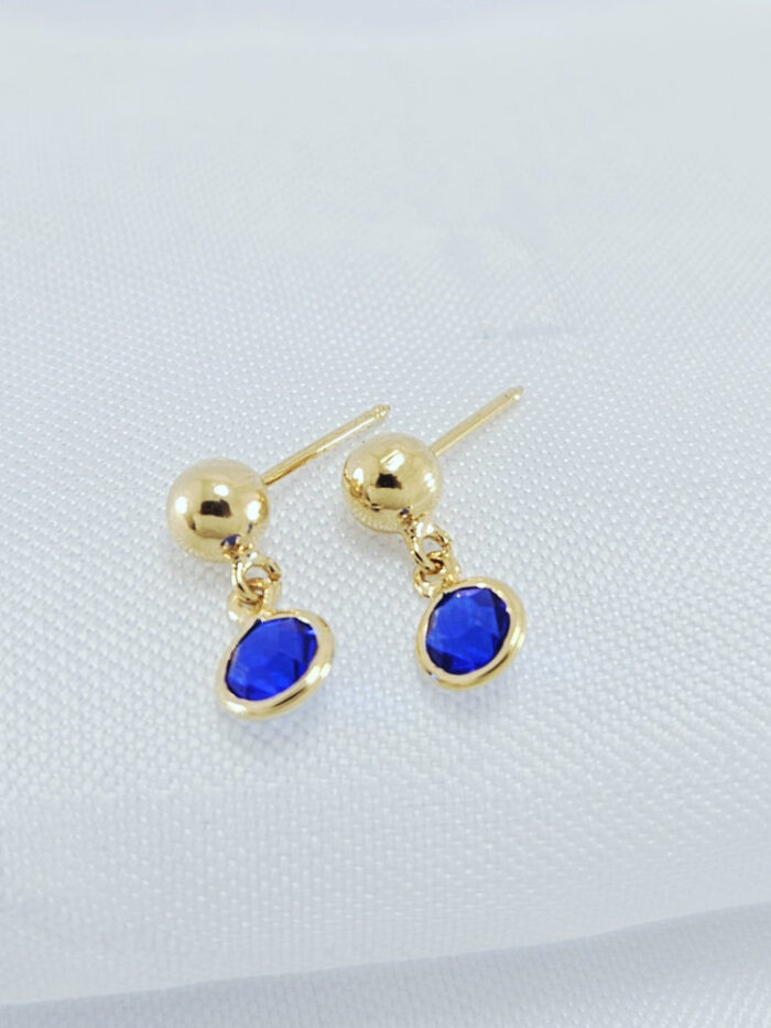 Brinco infantil esfera dourada pêndulo com pedra azul