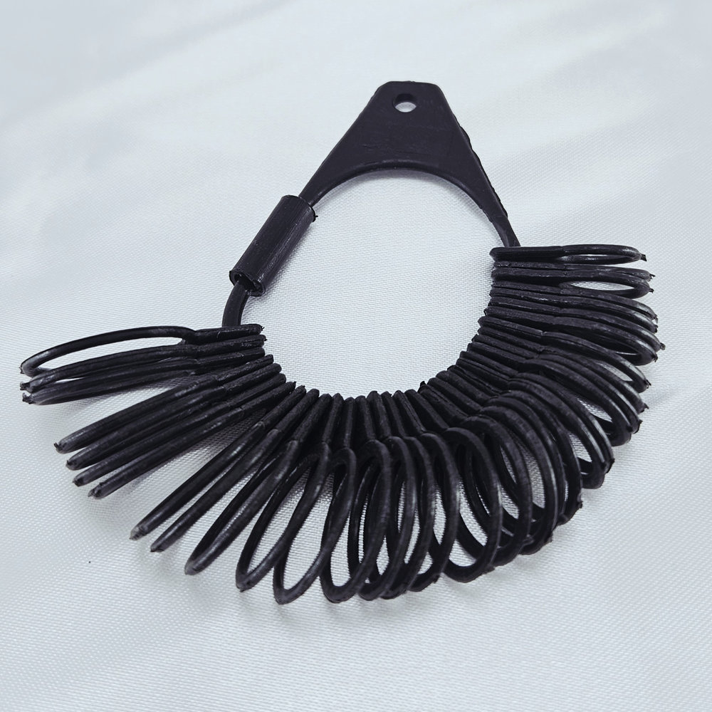 Medidor anelar preto