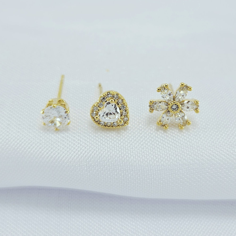 Trio de brincos ponto de luz, coração e flor cristal