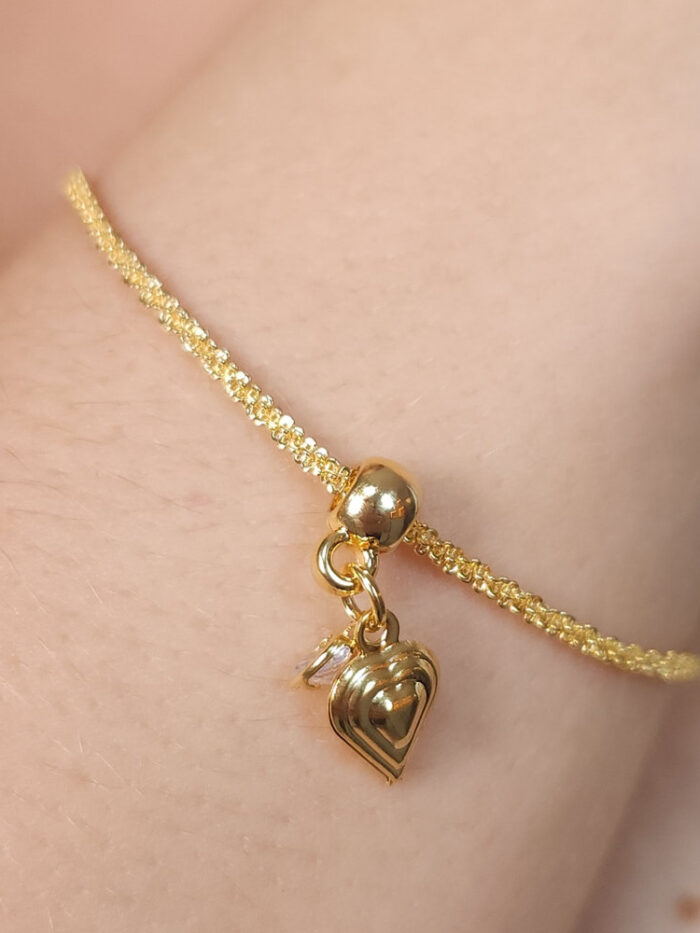 Pulseira com pingente corações