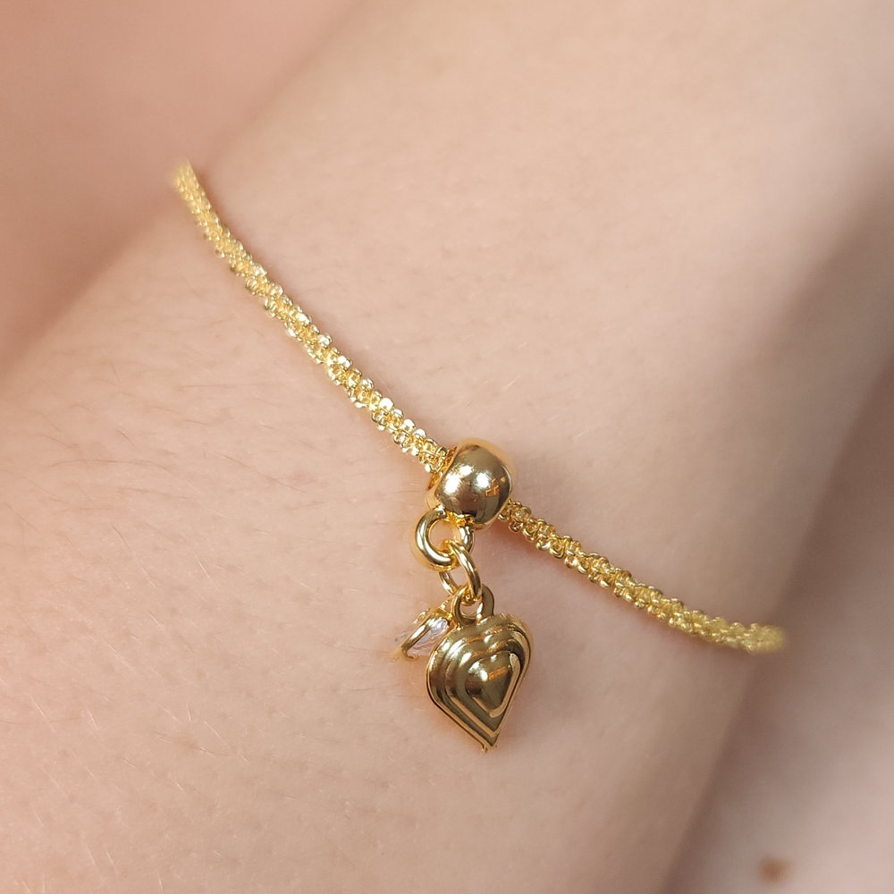 Pulseira com pingente corações