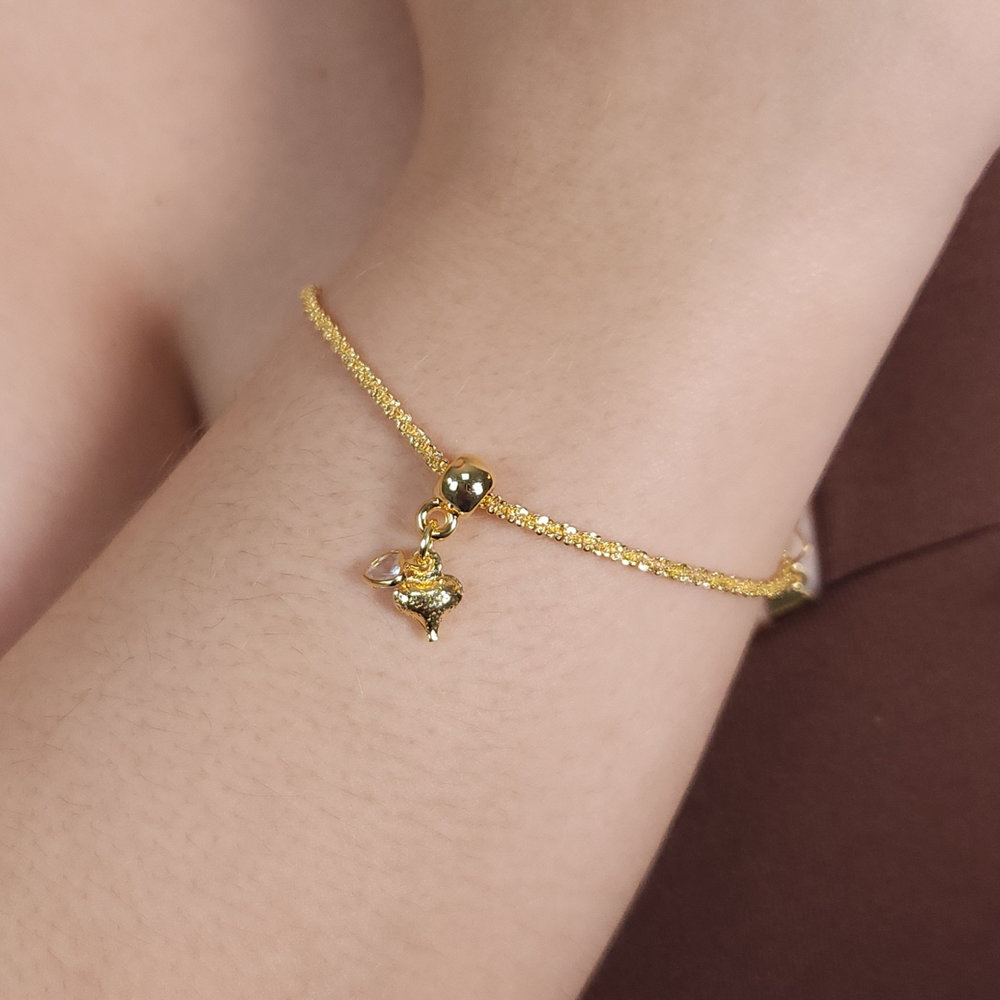 Pulseira detalhada coração pêndulo