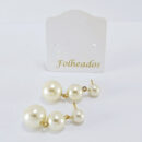 Brinco pérola tripla