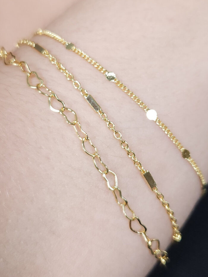 Pulseira tripla elos corações e ovais dourado