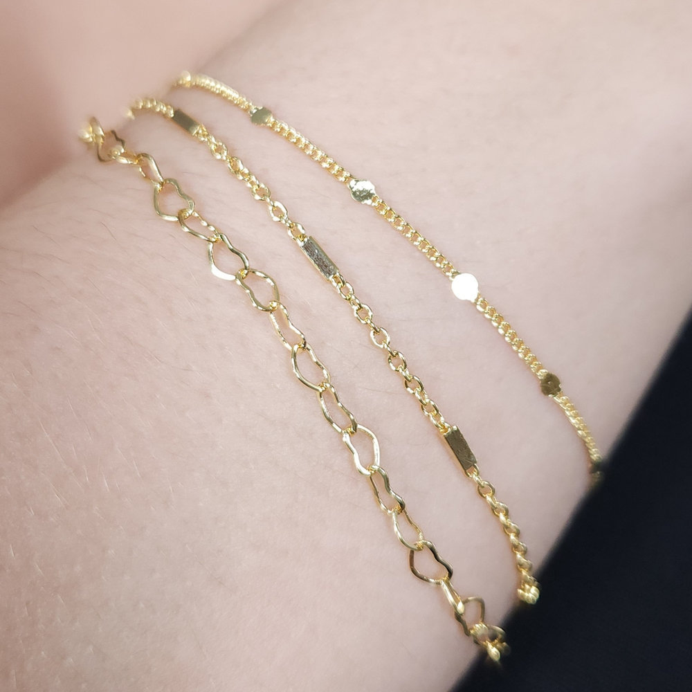 Pulseira tripla elos corações e ovais dourado