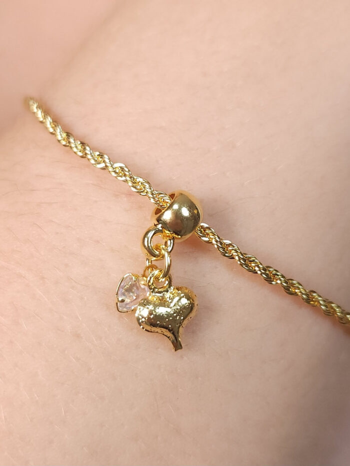 Pulseira coração dourado com ponto de luz