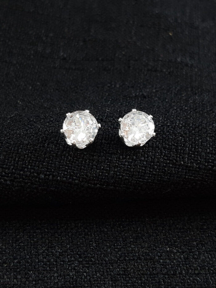 Brinco ponto de luz redondo