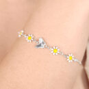 Pulseira elos cartier com margaridas e borboleta detalhado