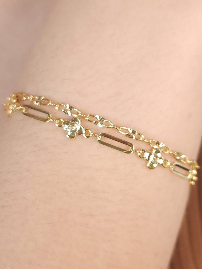 Pulseira dupla elos vazado detalhe trevo dourado