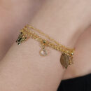 Pulseira tripla com pingentes variados