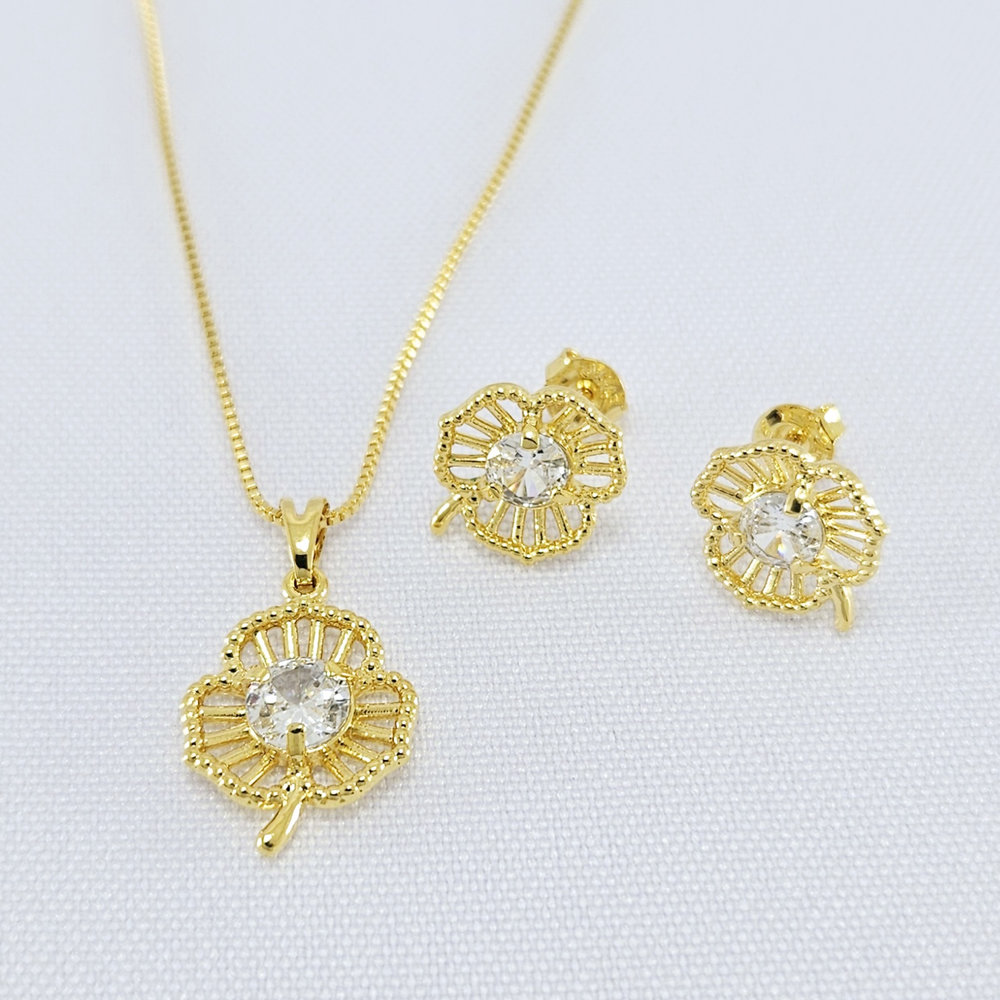 Conjunto flor com pedra cristal