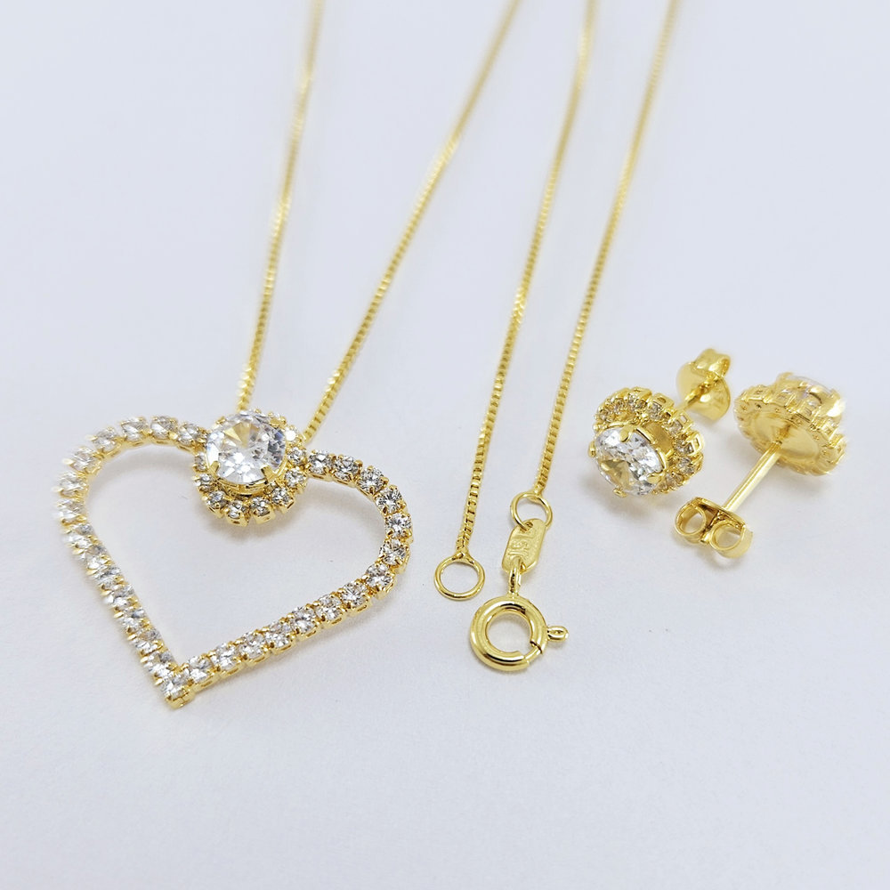 Conjunto pingente coração vazado com pedra central cristal