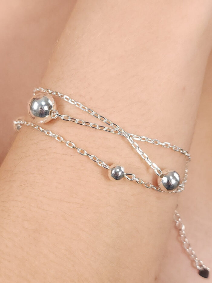 Pulseira tripla elo cartier com bolas prateadas