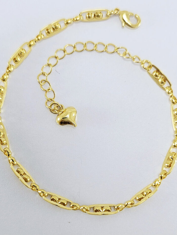 Pulseira elos oval detalhe bolas dourada