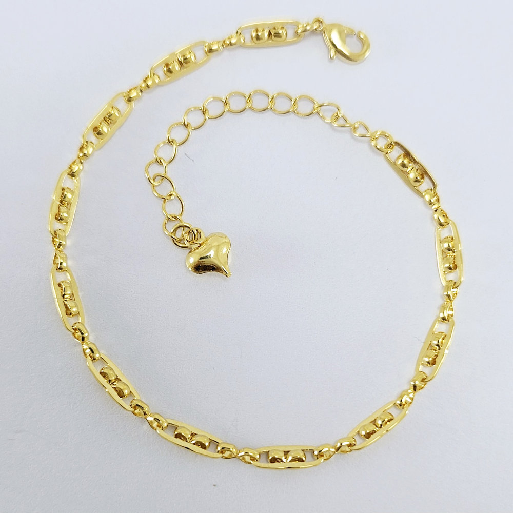 Pulseira elos oval detalhe bolas dourada