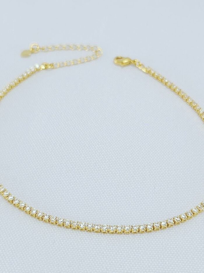 Tornozeleira riviera com pedra cristal