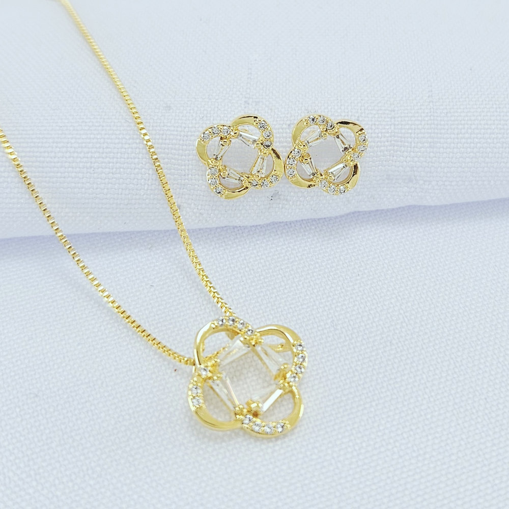 Conjunto flor vazado com zircônia