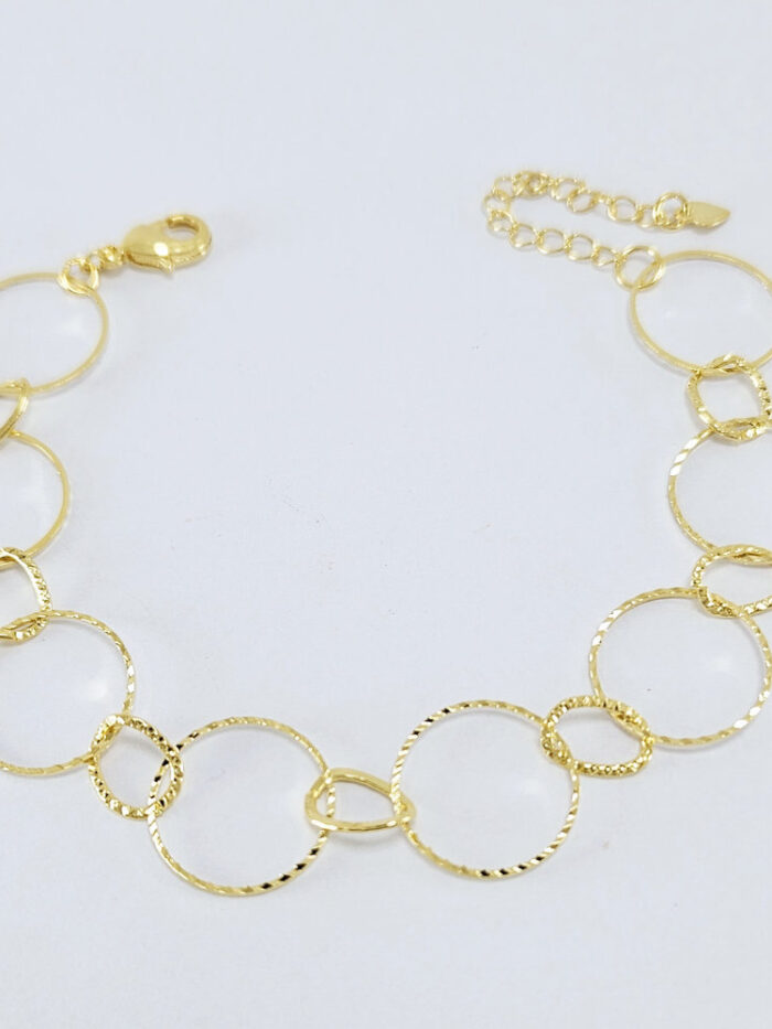 Pulseira círculos vazado detalhado