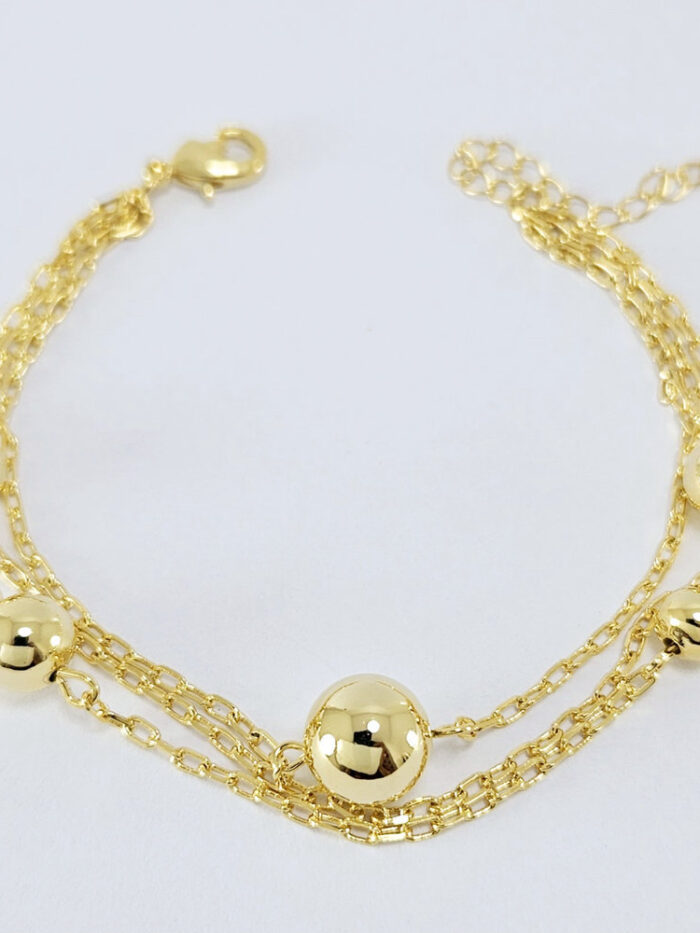 Pulseira dupla bola dourada