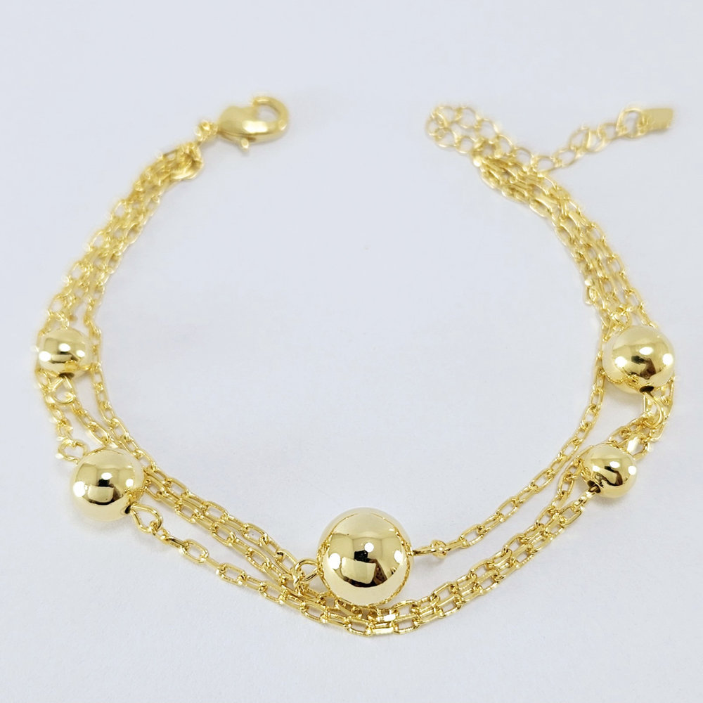 Pulseira dupla bola dourada