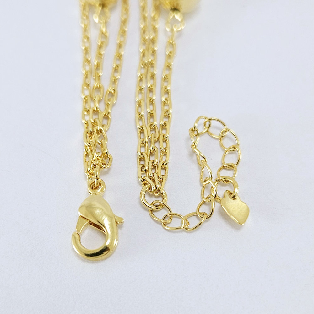 Pulseira dupla bola dourada - Imagem 2