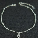 Tornozeleira bolinhas prateada detalhe flor vazada