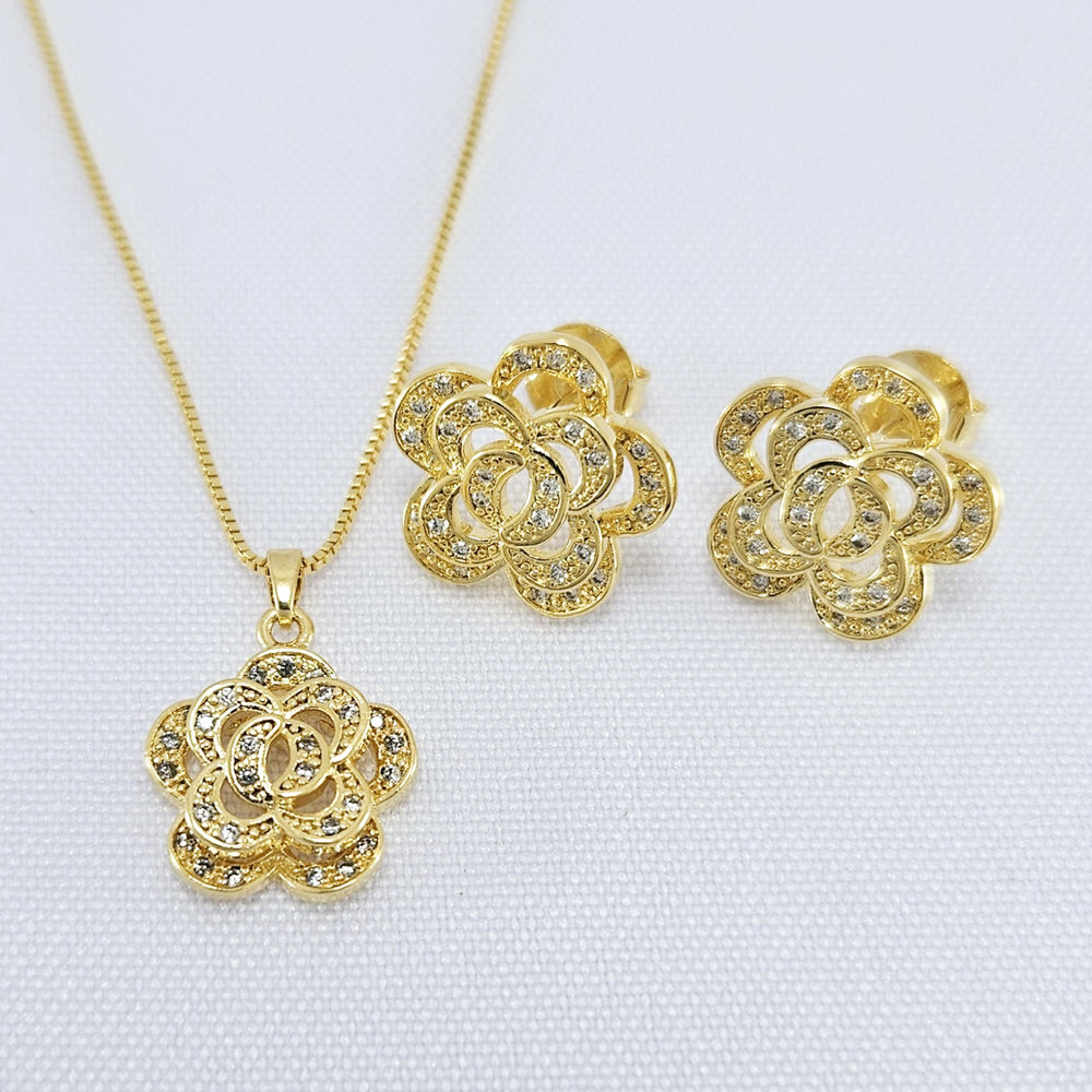 Conjunto estilo flor vazado e cravejado