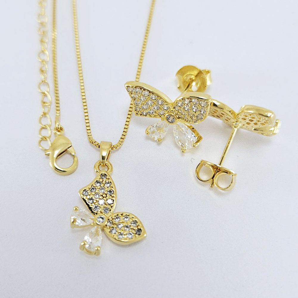Conjunto borboleta cravejado com pedra cristal