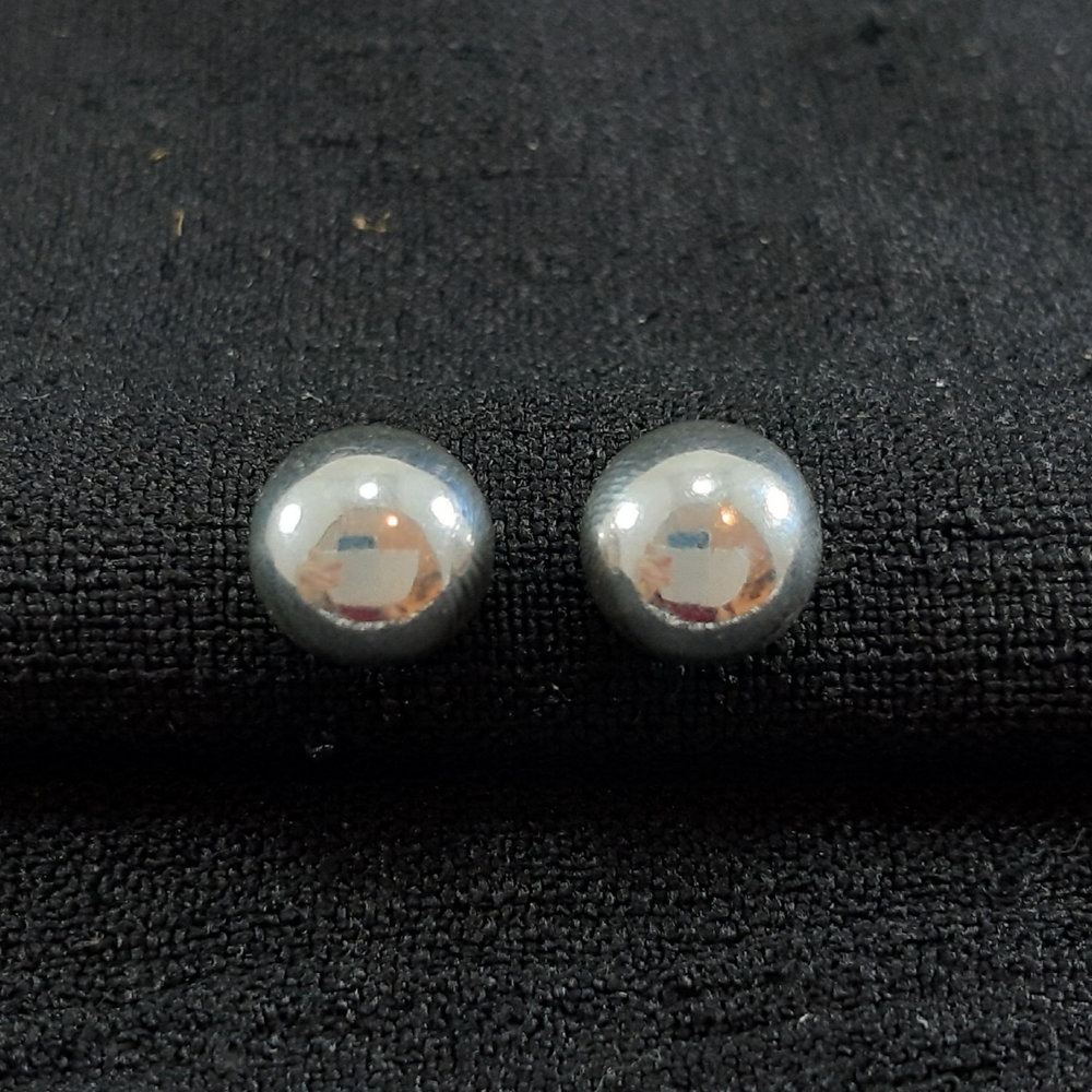 Brinco bola prateada