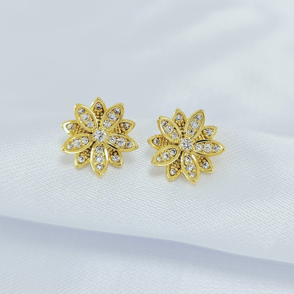 Brinco flor com pedra cristal