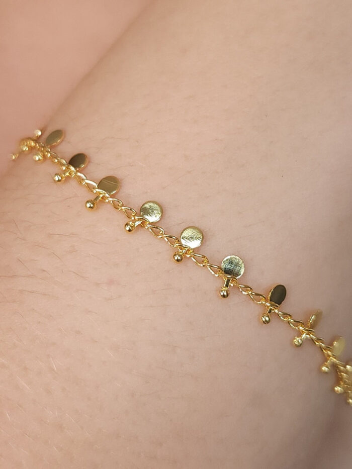 Pulseira bolinhas achatados dourado