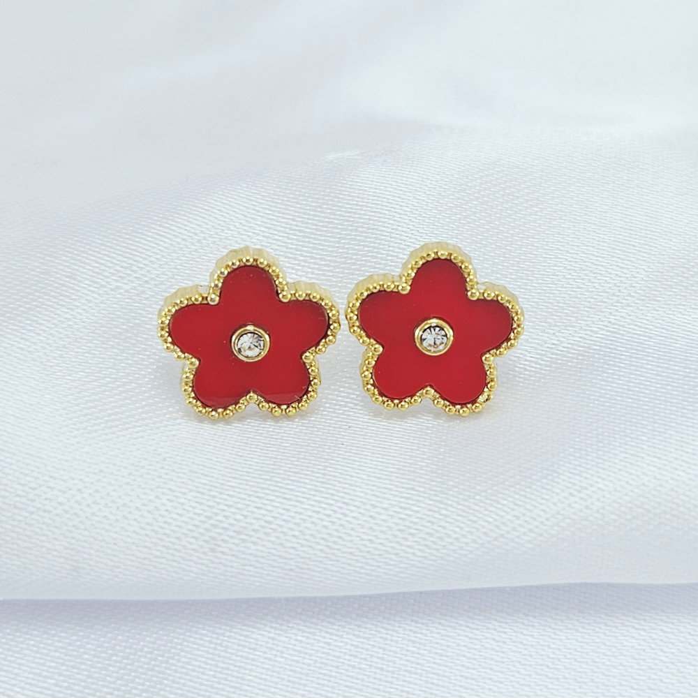 Brinco trevo com pedras detalhada