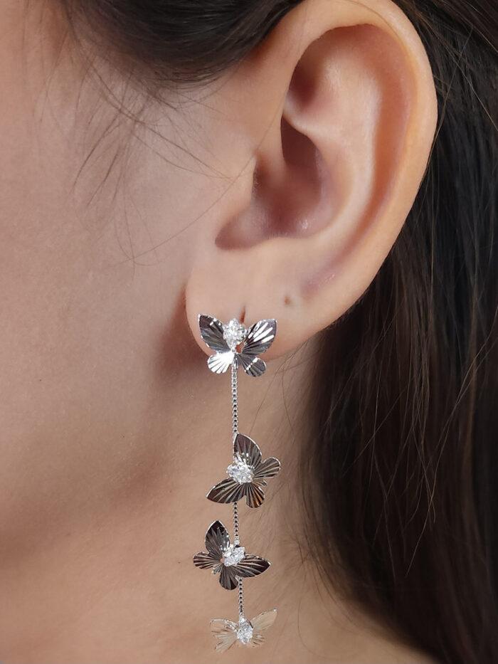 Brinco borboletas com zircônia