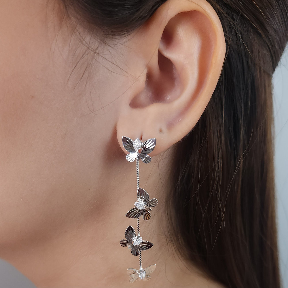 Brinco borboletas com zircônia