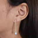 Brinco fio riviera pêndulo gota pérola