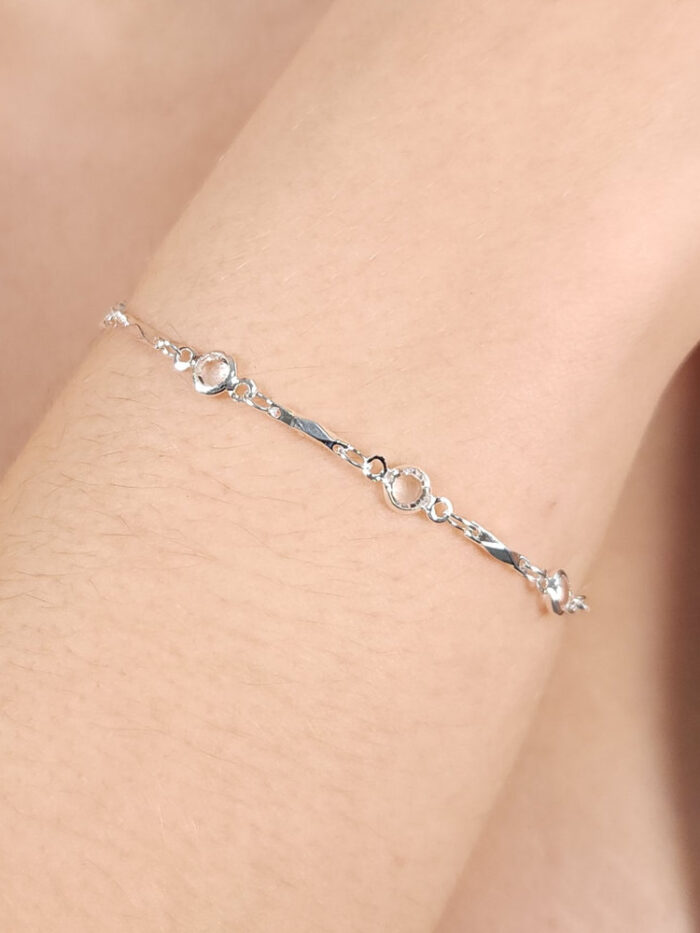 Pulseira fios torcidos com ponto de luz