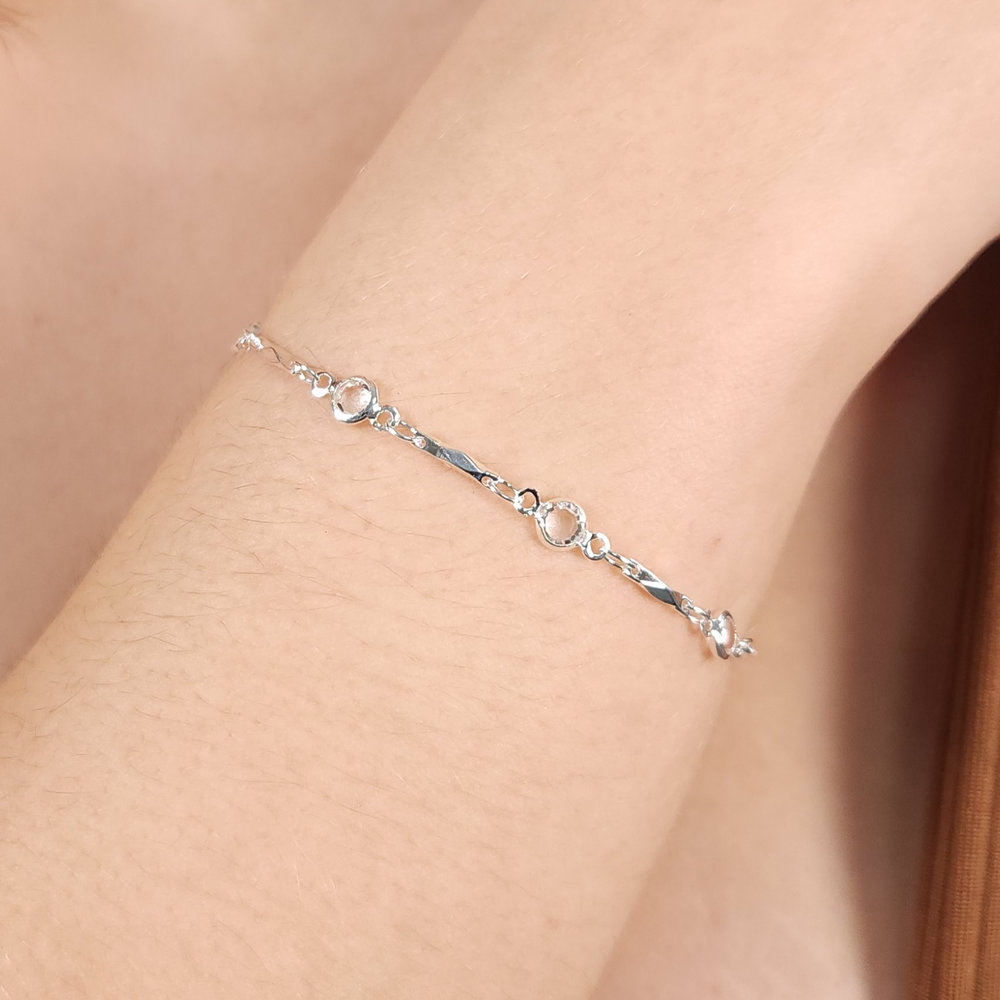 Pulseira fios torcidos com ponto de luz