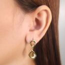 Brinco estilo oval duplo dourado