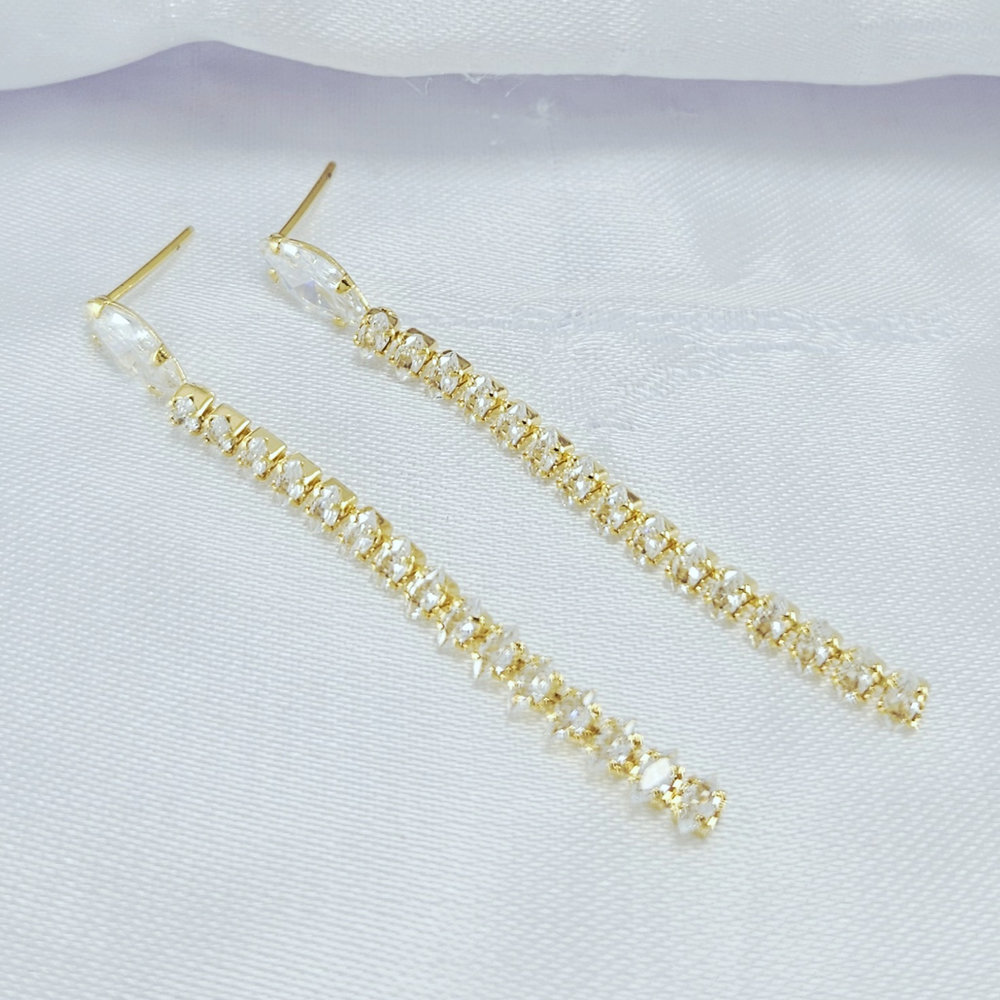 Brinco fio riviera base oval com pedras navete - Imagem 2