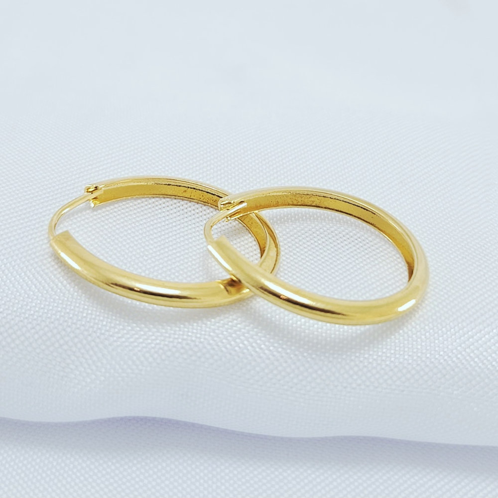 Brinco argola oval dourada