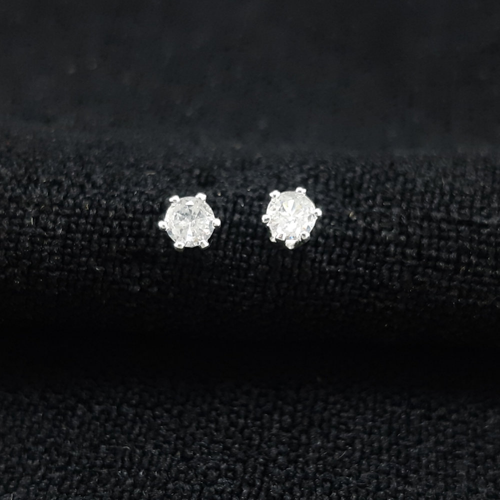 Brinco ponto de luz minimalista