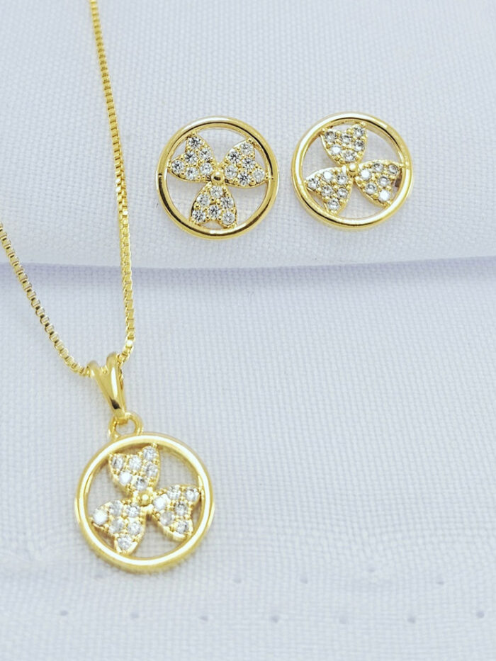 Conjunto círculo flor central cravejada