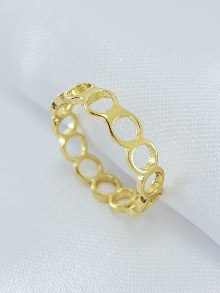 Anel círculo vazado dourado