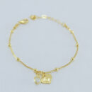 Pulseira infantil veneziana com bolinhas douras e corações