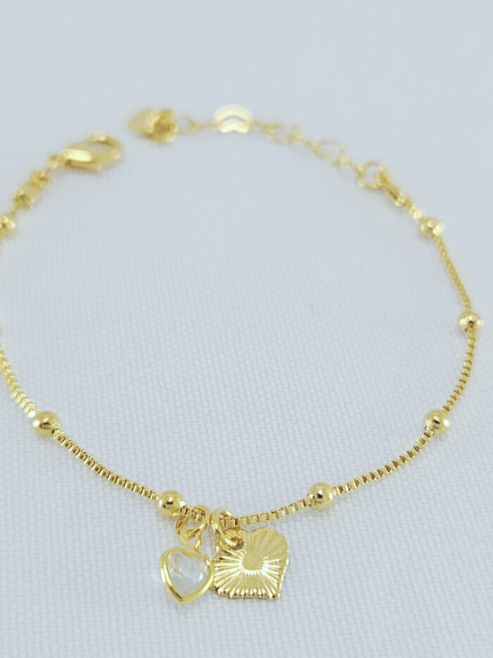 Pulseira infantil veneziana com bolinhas douras e corações