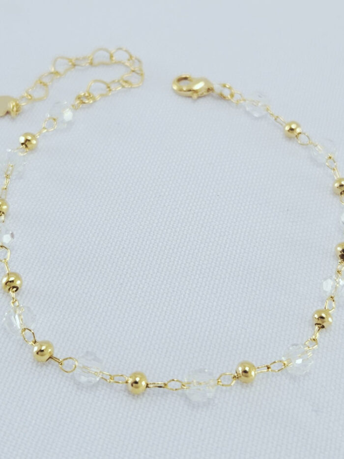 Pulseira com pedras cristal e bolas douradas