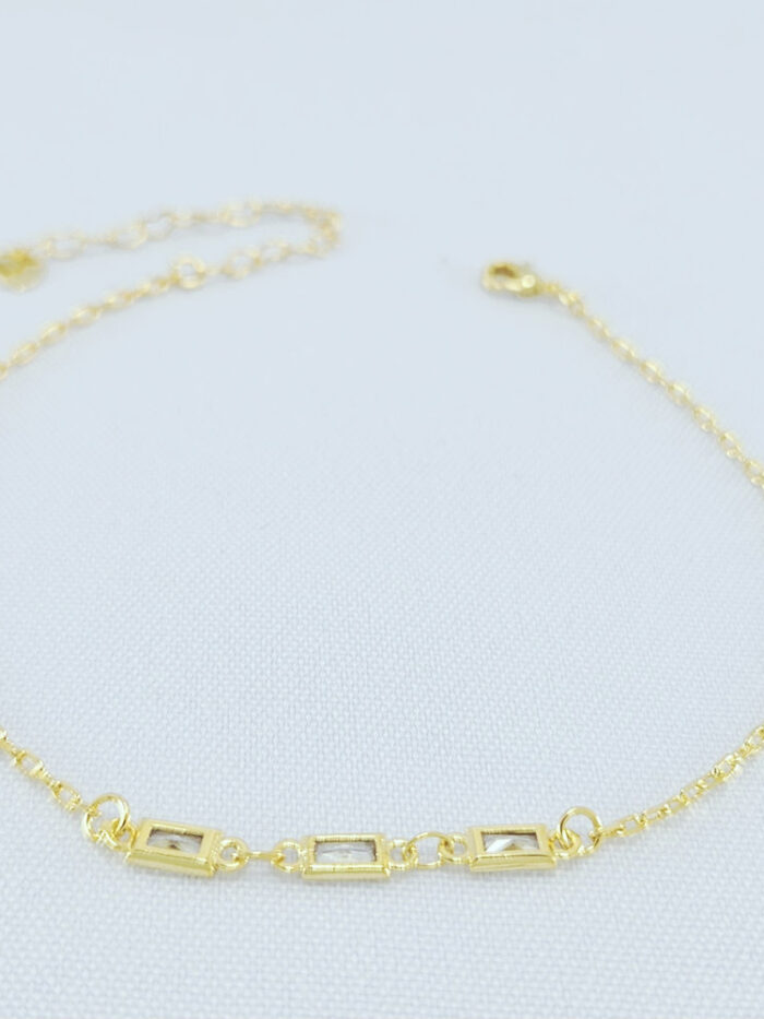 Tornozeleira elos cartier com pedra retângular cristal