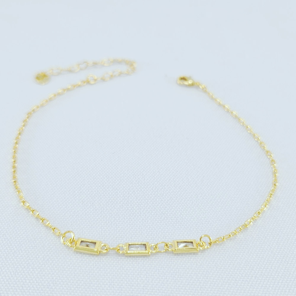 Tornozeleira elos cartier com pedra retângular cristal